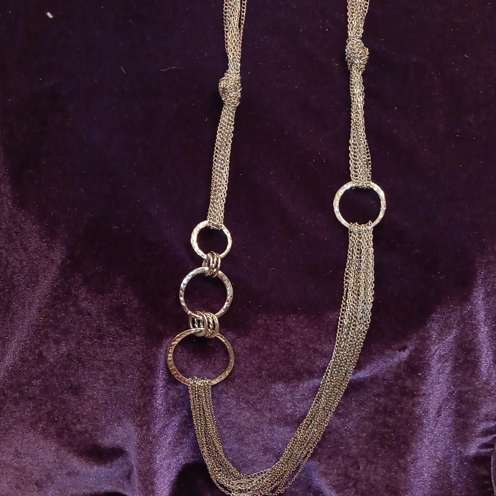 A stunning silver 12 strand chain. Length 39 inches.  knotted twice.